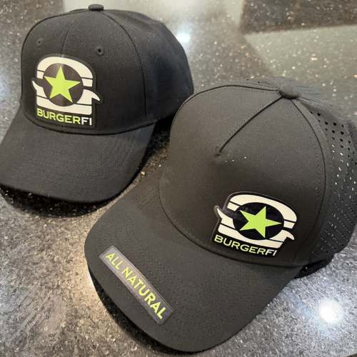 Two BurgerFi caps with raised 3D UV patches