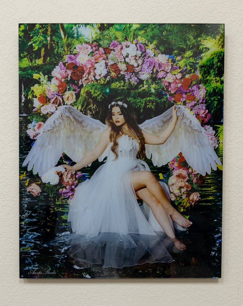 Portrait printed on acrylic and hung on a wall