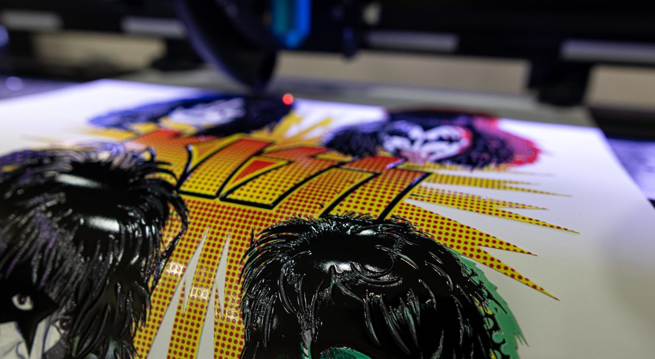 Patches printing on the UV flatbed under its curing lamp