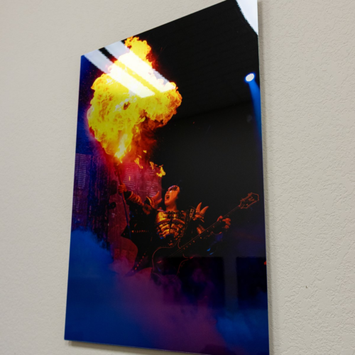 Metal print of a fire photo, angled on a table