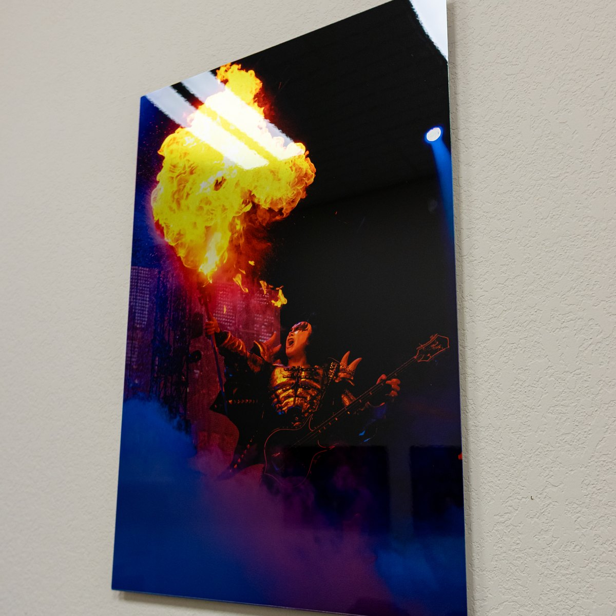 Metal print of a fire photo hanging on the wall