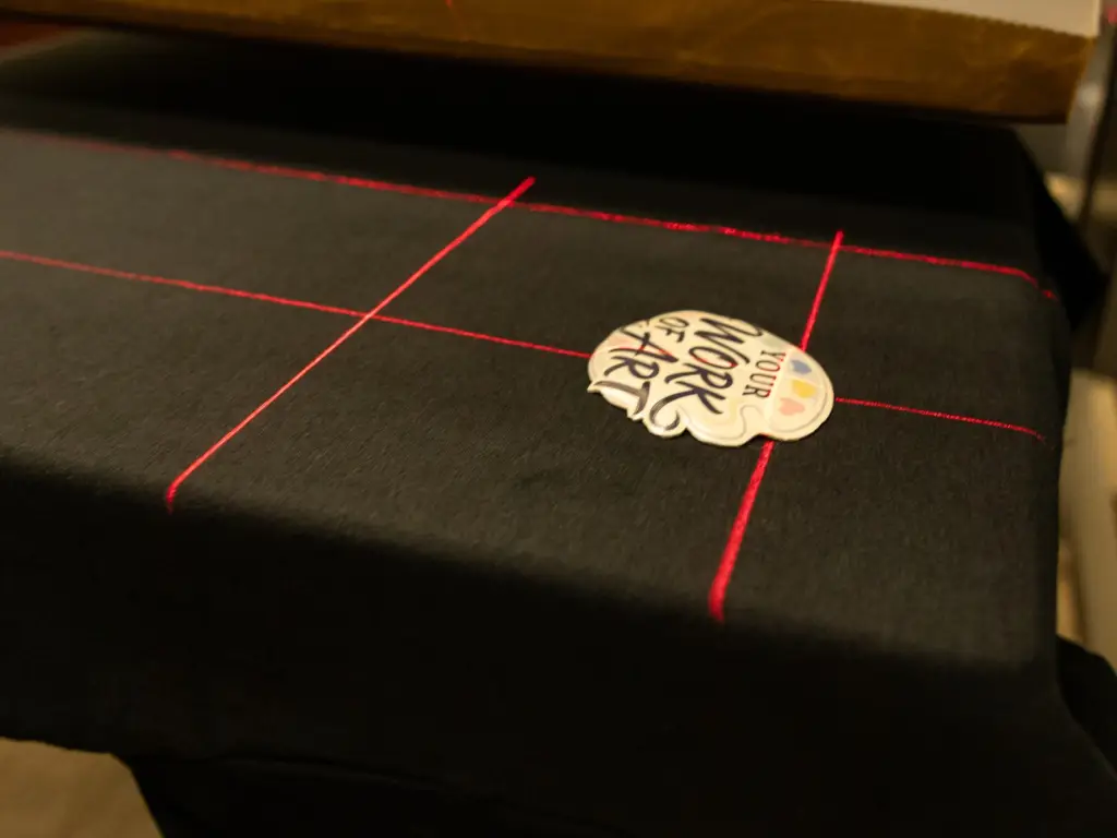 Heat press and laser cutter for finishing patches